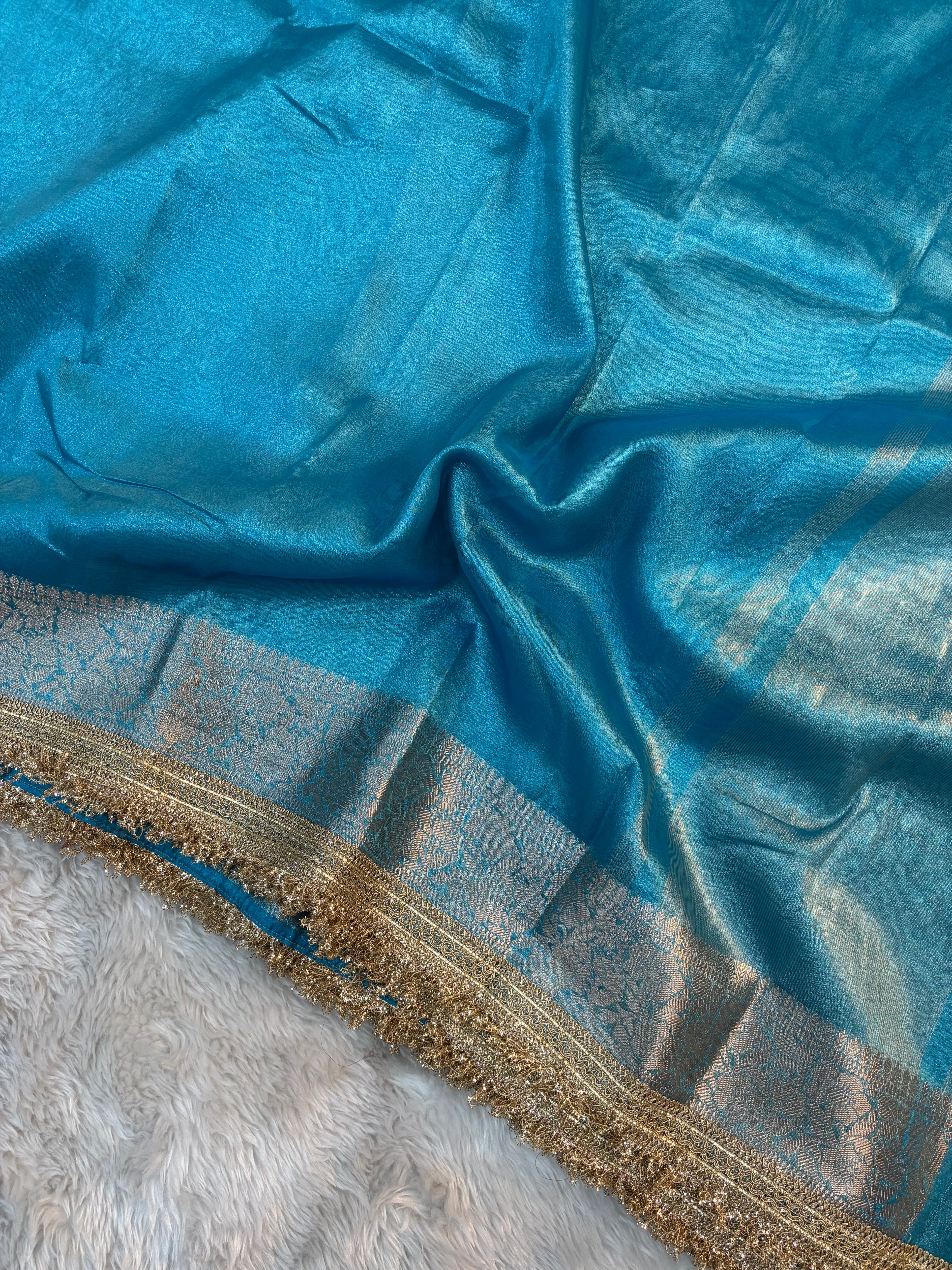 LIGHT BLUE SHADE SOFT TISSUE SILK SAREE WITH LACE ATTACHED