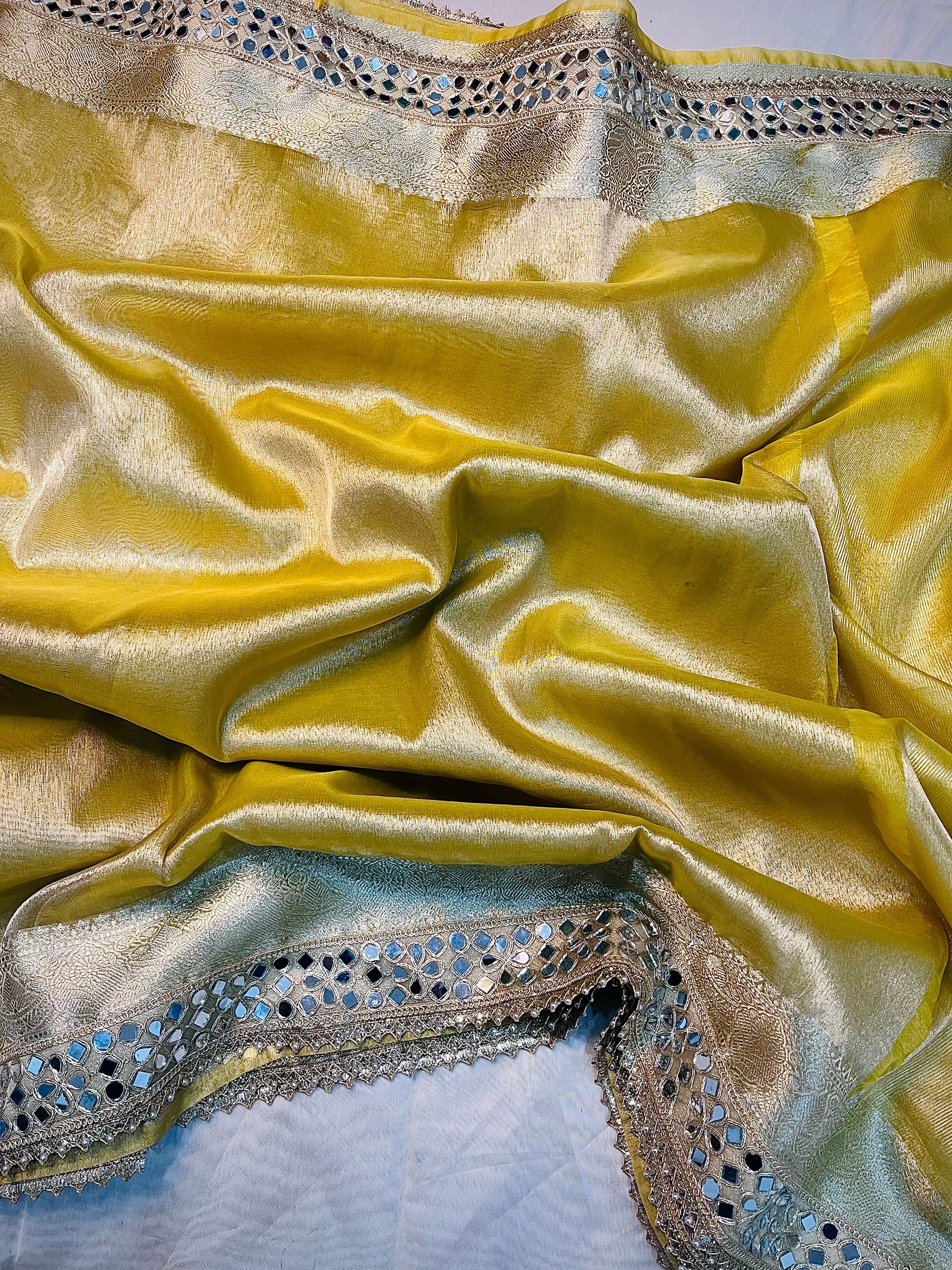 EXCLUSIVE YELLOW SHADE SOFT  TISSUE SILK SAREE WITH DESIGNER LACE ATTACHED