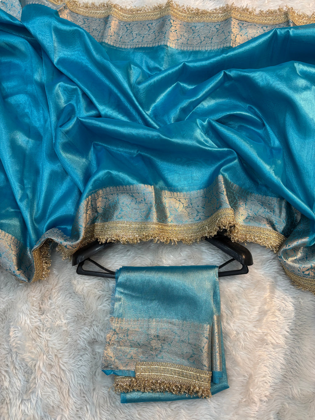 LIGHT BLUE SHADE SOFT TISSUE SILK SAREE WITH LACE ATTACHED