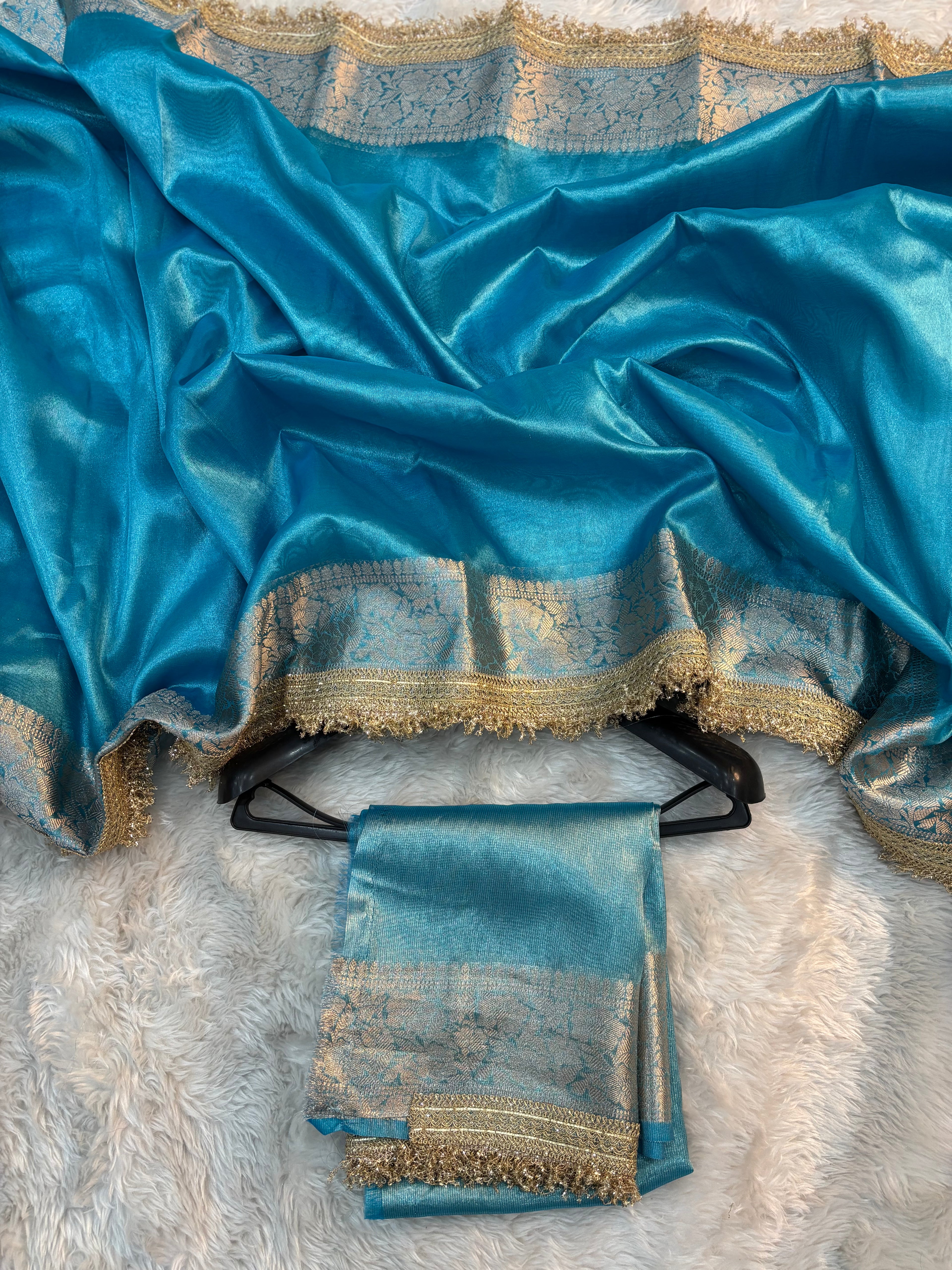 LIGHT BLUE SHADE SOFT TISSUE SILK SAREE WITH LACE ATTACHED