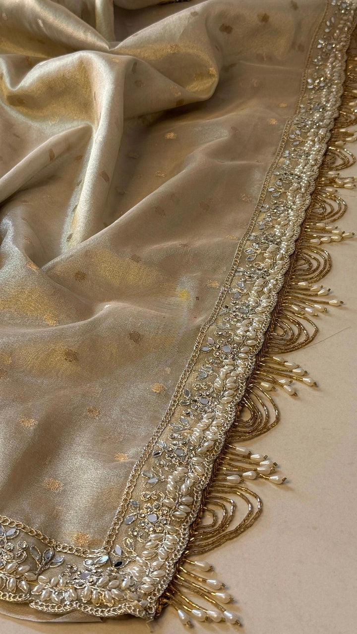 LUXURIOUS IVORY SHADE DESIGNER SOFT TISSUE SILK BOOTI SAREE WITH  LACE ATTACHED