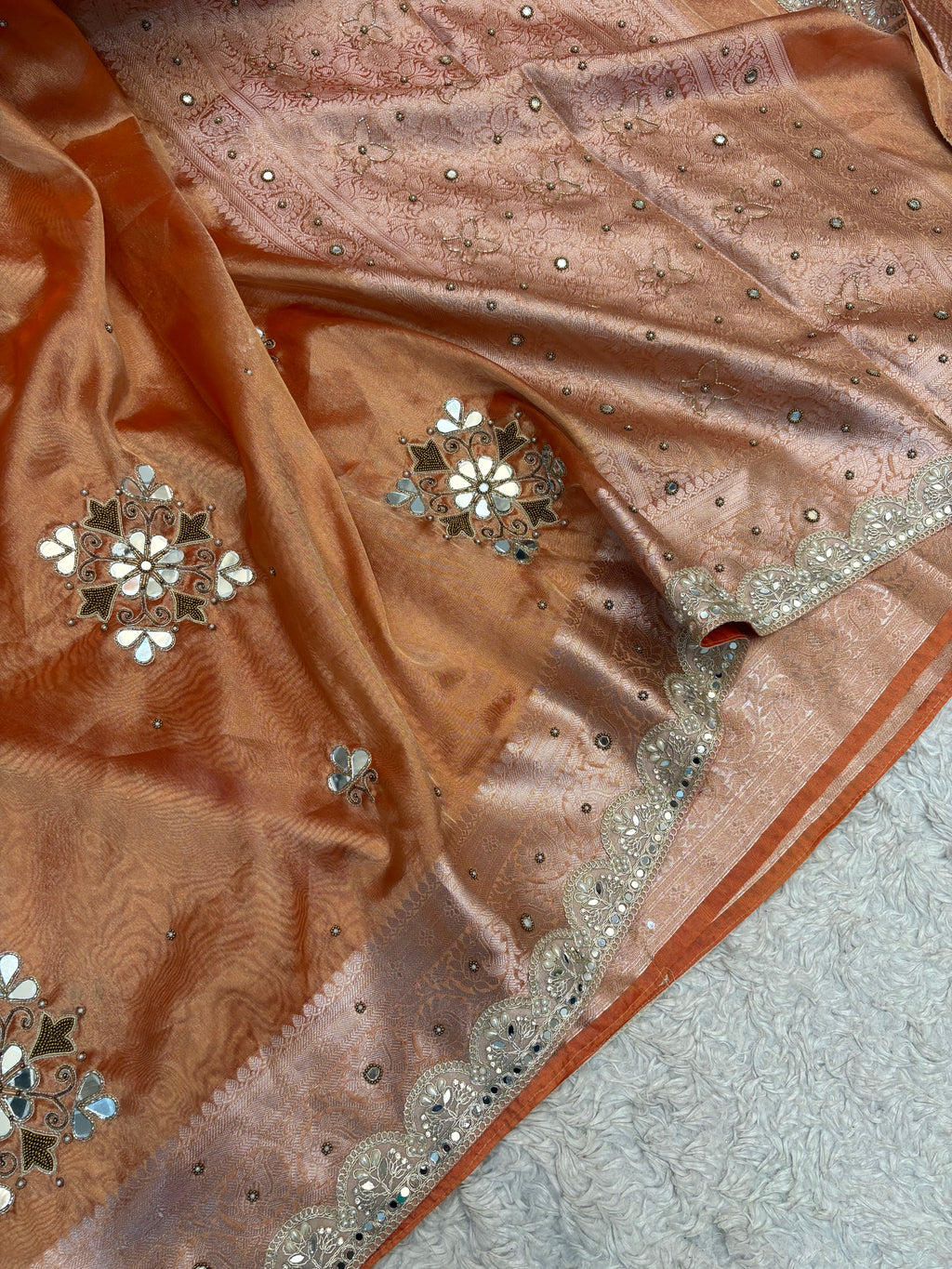 LUXURIOUS ORANGE SHADE SOFT TISSUE SILK SAREE WITH PREMIUM ZARDOZI MIRROR WORK AND LACE ATTACHED