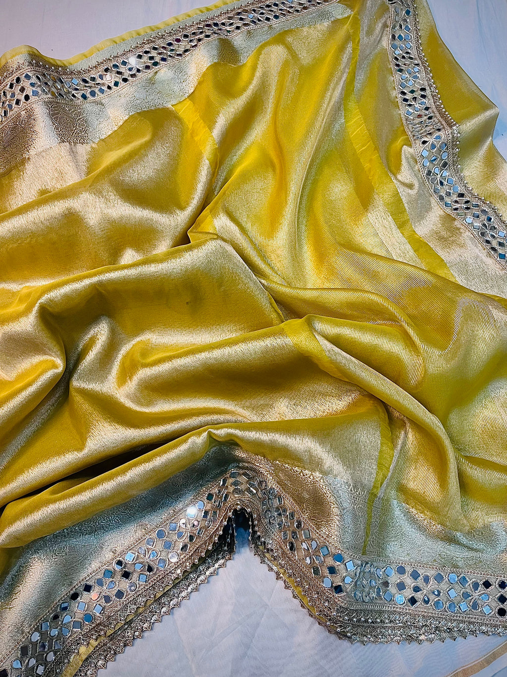 EXCLUSIVE YELLOW SHADE SOFT  TISSUE SILK SAREE WITH DESIGNER LACE ATTACHED
