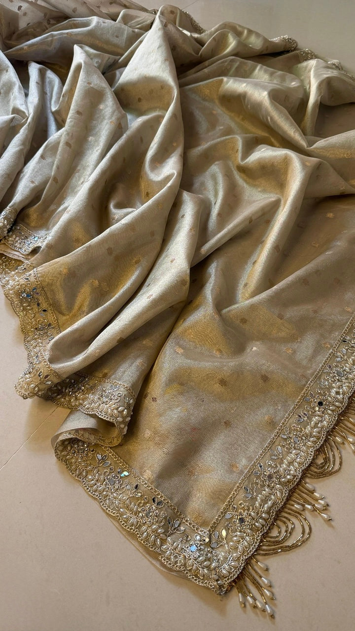 LUXURIOUS IVORY SHADE DESIGNER SOFT TISSUE SILK BOOTI SAREE WITH  LACE ATTACHED