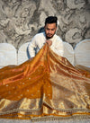 PREMIUM MUSTARD ORANGE SHADE BANARASI SOFT TISSUE SILK WITH MIRROR WORK DESIGNER SAREE