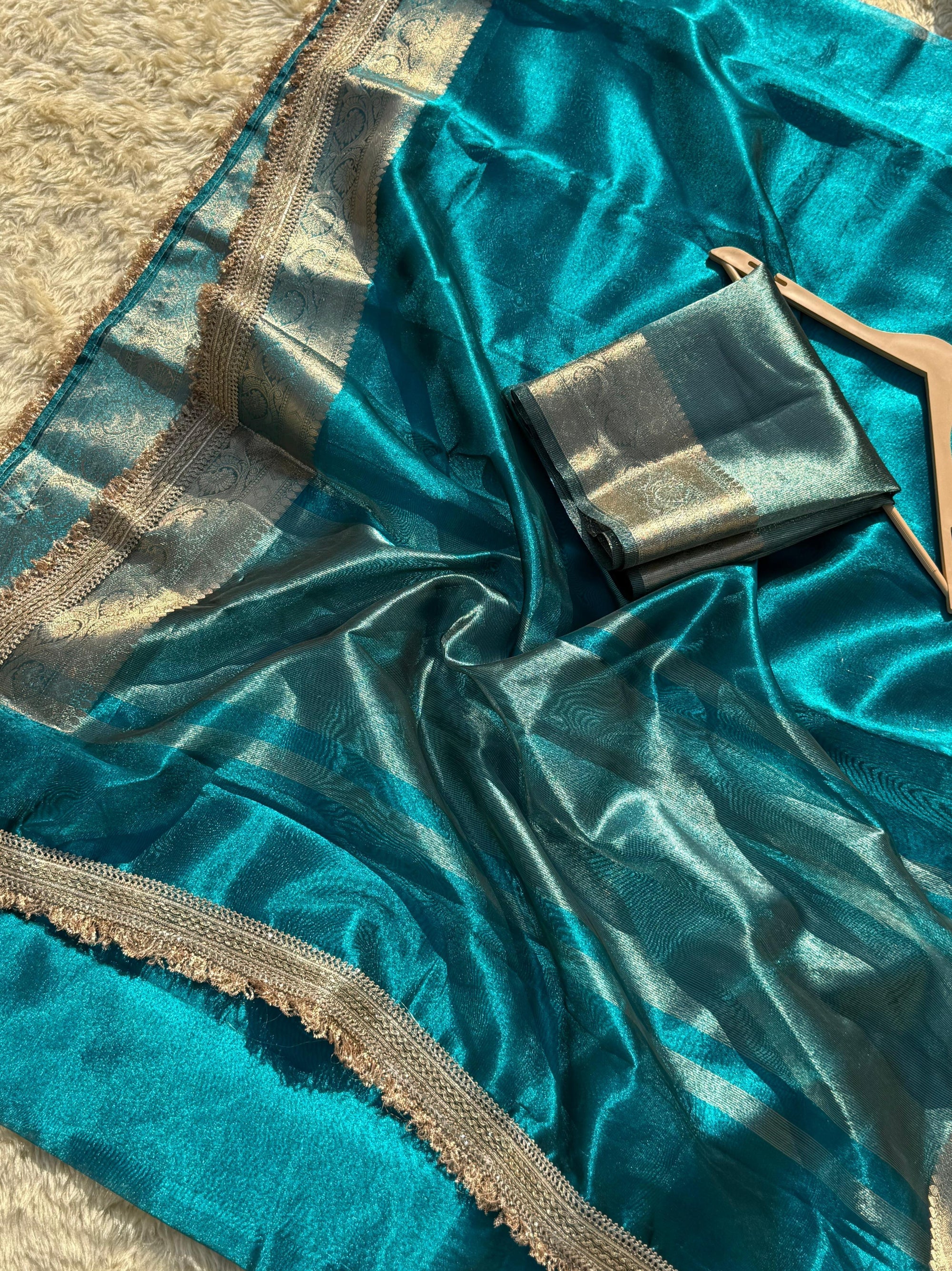 CRYSTAL BLUE SOFT TISSUE SILK SAREE WITH LACE ATTACHED 