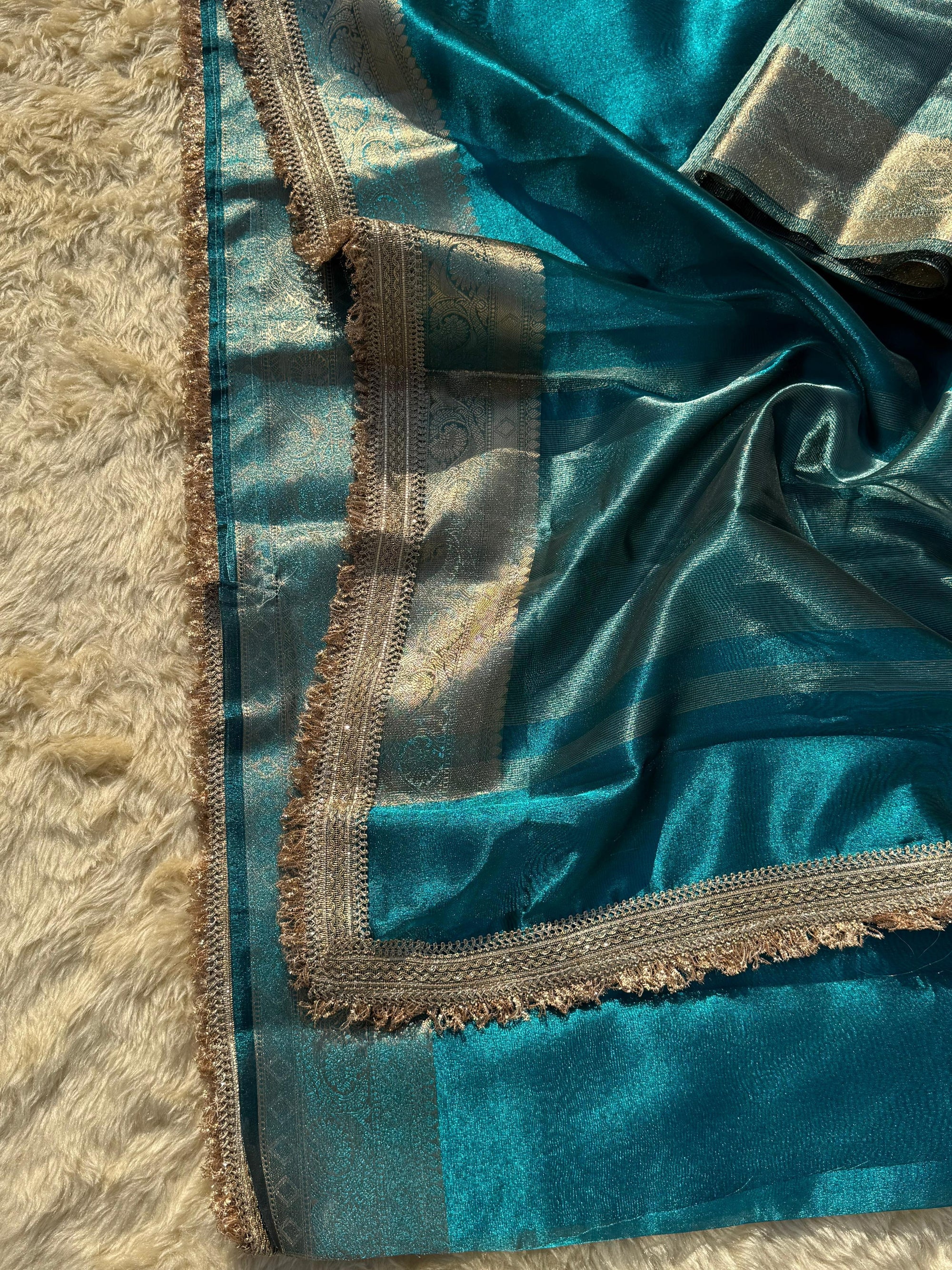 CRYSTAL BLUE SOFT TISSUE SILK SAREE WITH LACE ATTACHED 