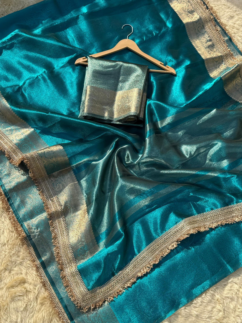 CRYSTAL BLUE SOFT TISSUE SILK SAREE WITH LACE ATTACHED 