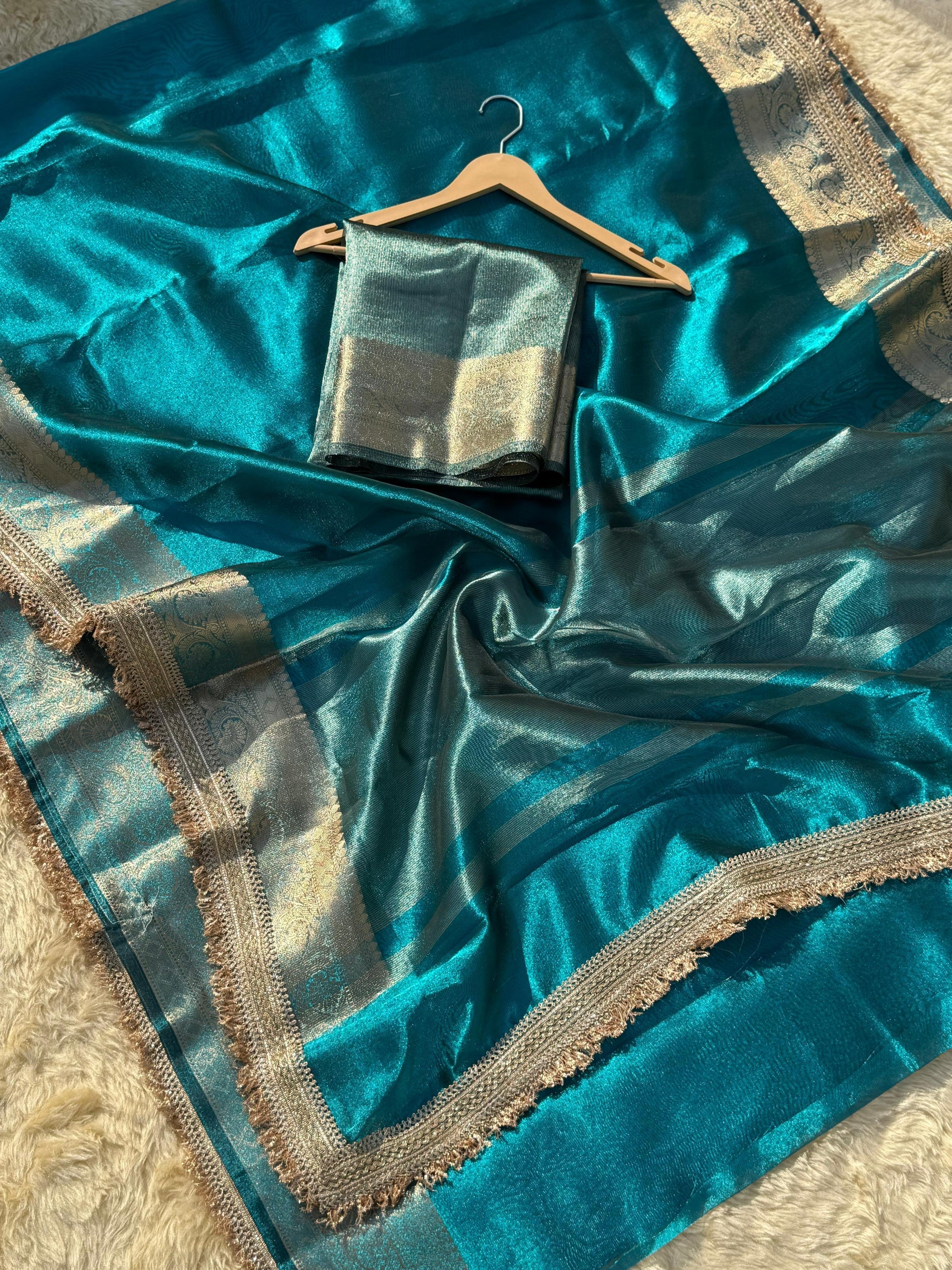 CRYSTAL BLUE SOFT TISSUE SILK SAREE WITH LACE ATTACHED 